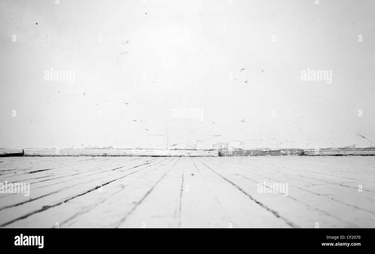 Vintage interno del muro di pietra e pavimento in legno Foto Stock