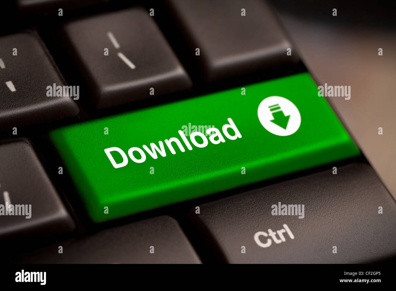 Un verde scarica il tasto enter key Foto Stock