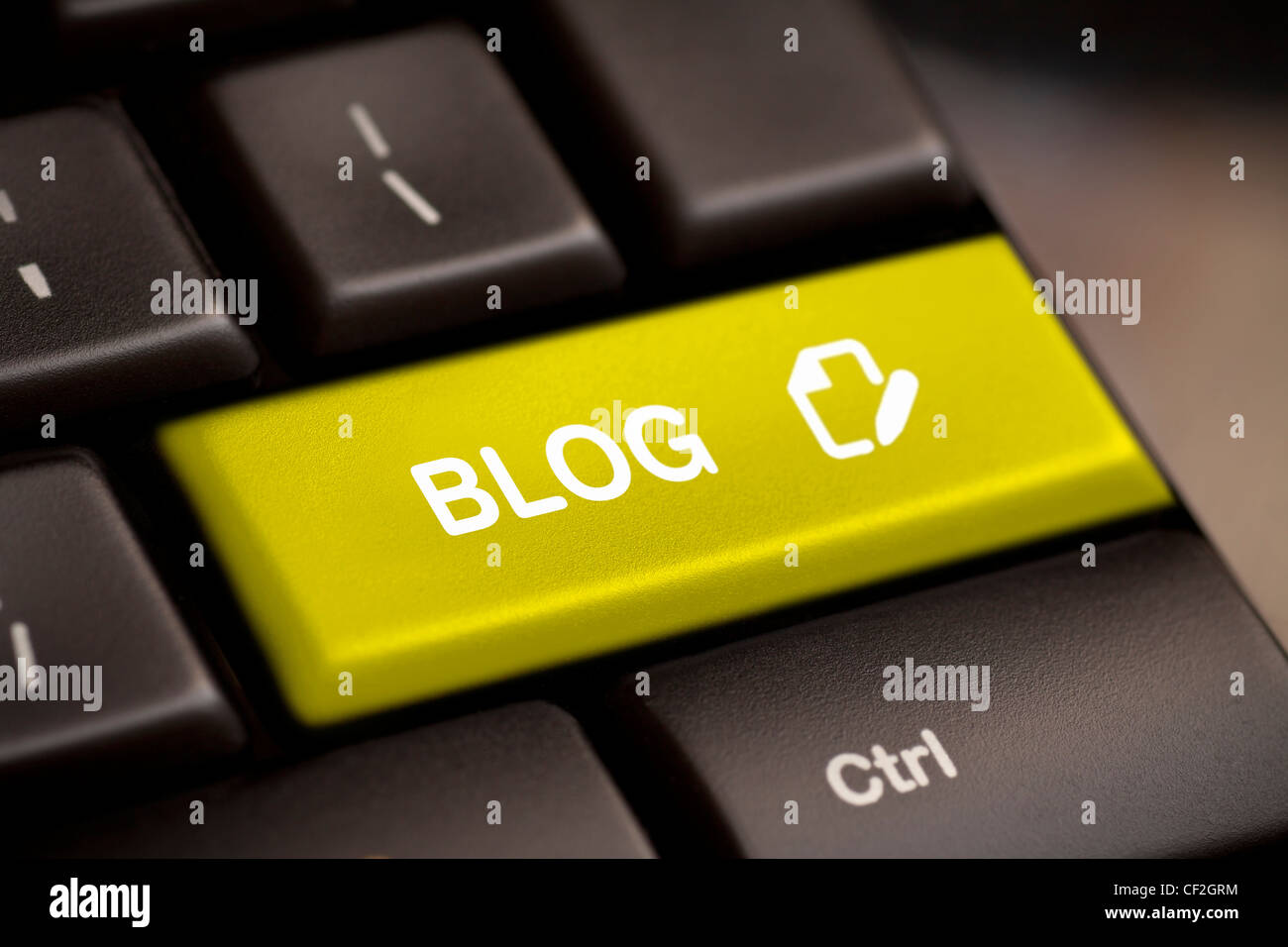 Il blog di giallo il tasto enter key Foto Stock