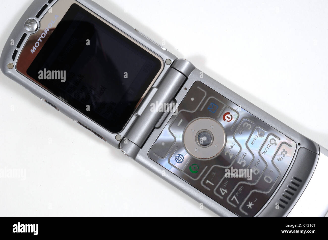 Un argento Rasor Motorola Flip phone giacente aperta Foto Stock