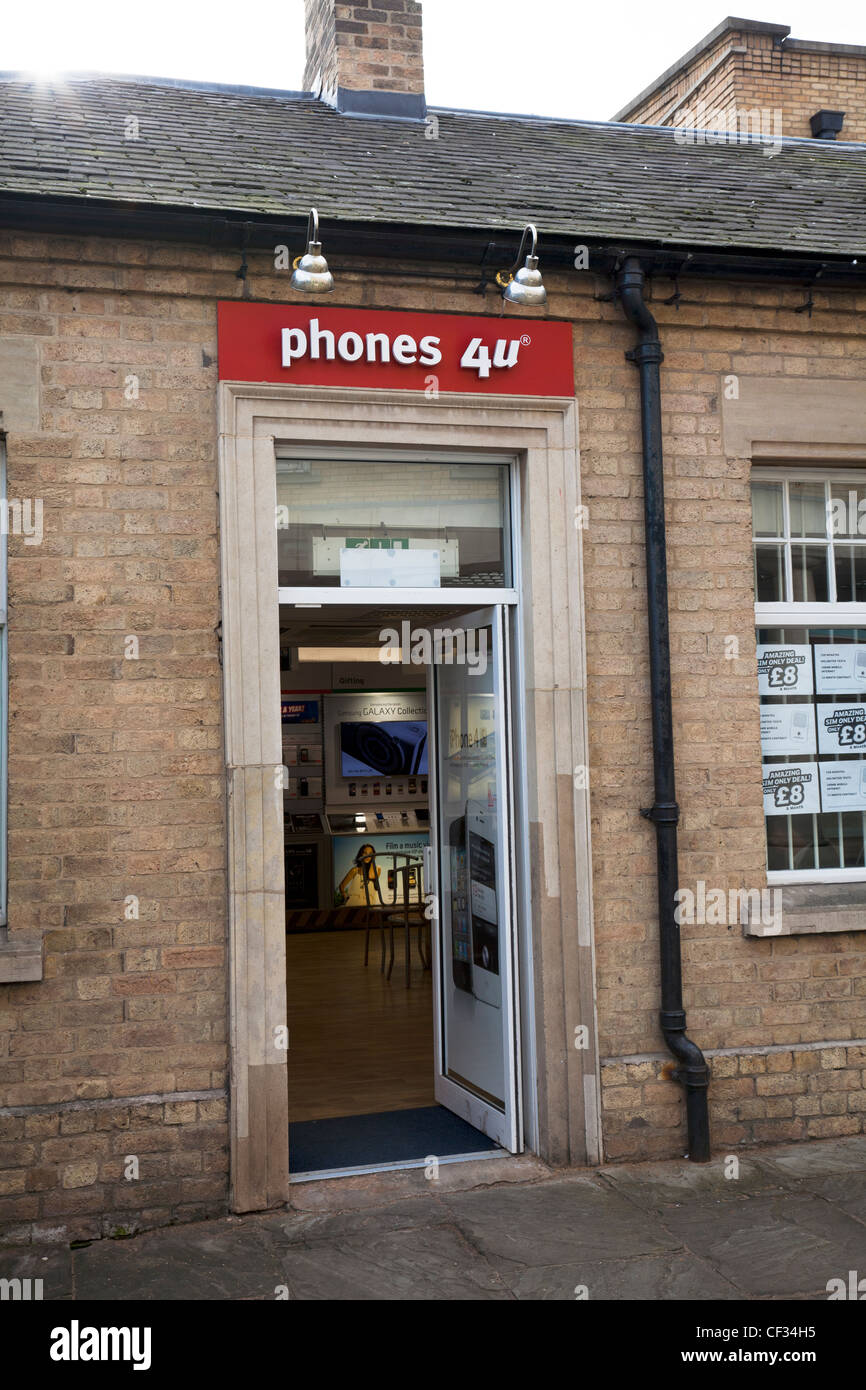 Telefoni 4 u shop on Lincoln City high street porta anteriore segno di ingresso Foto Stock