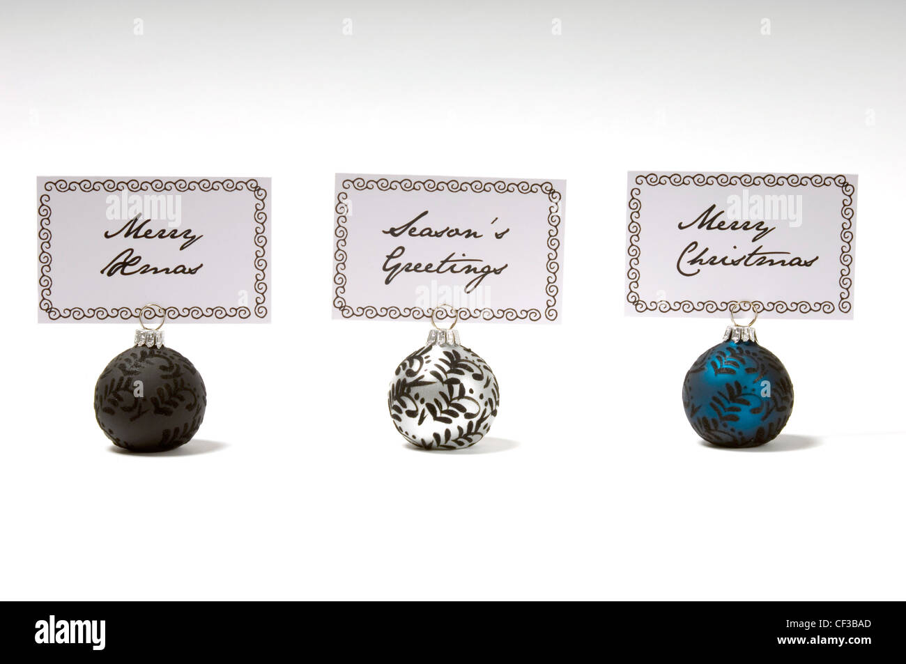 Nome ninnolo titolari di carta di credito con gli auguri di Natale Foto Stock