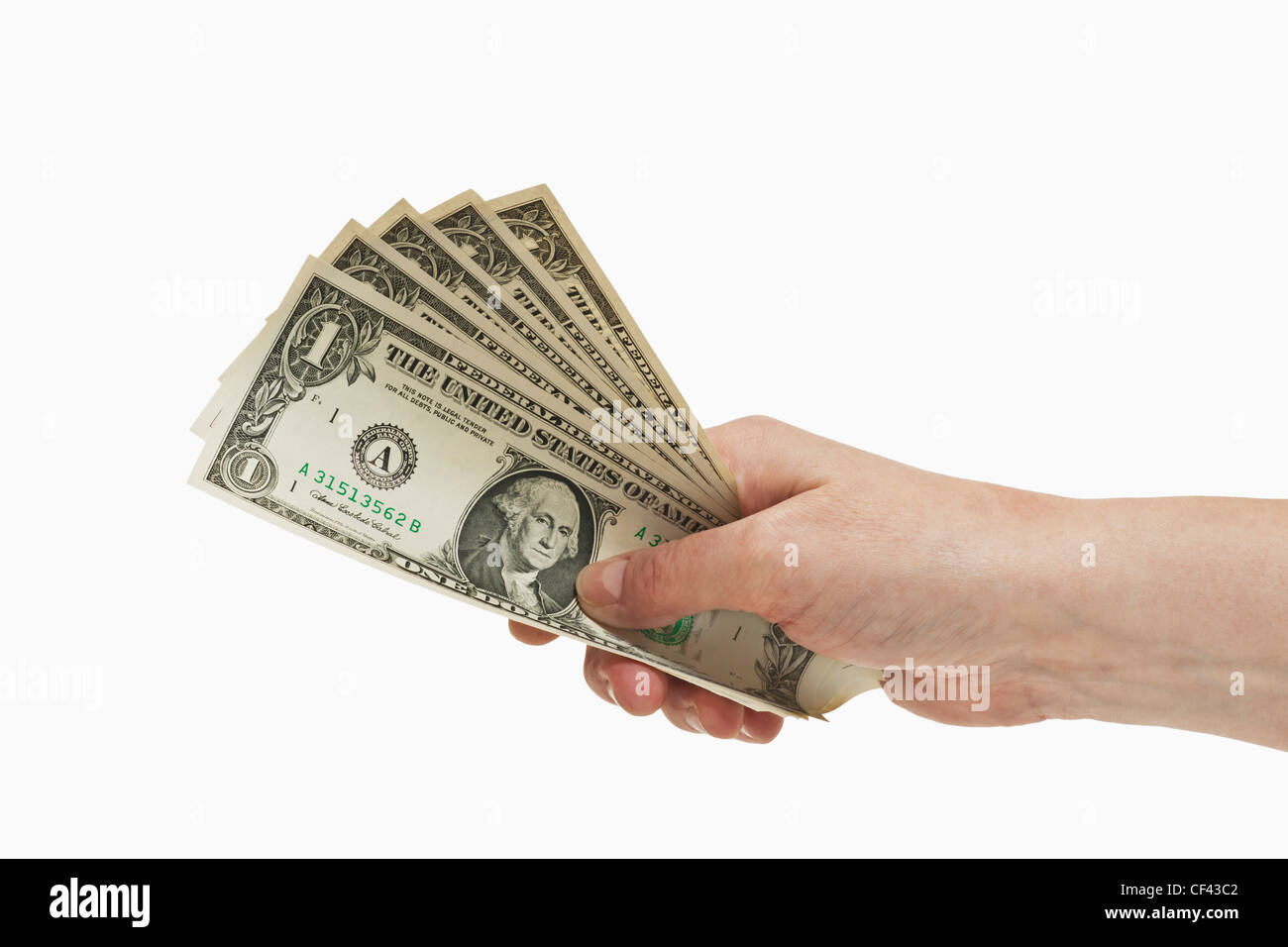 Cinque 1 U.S. Le fatture del dollaro sono tenute in mano, sfondo bianco Foto Stock