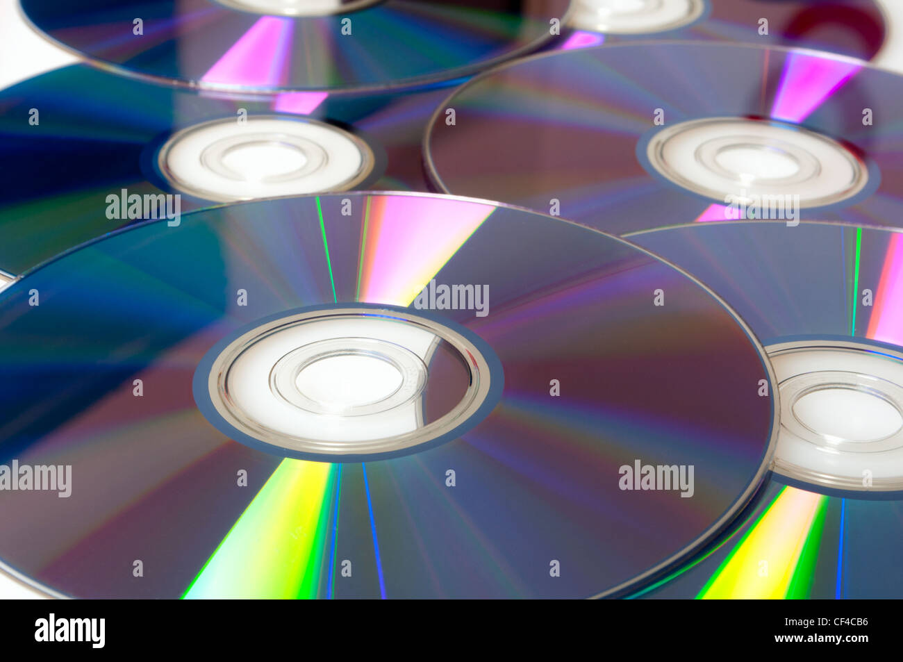 Sfondo di molti Shiny Compact Disc CD Foto Stock