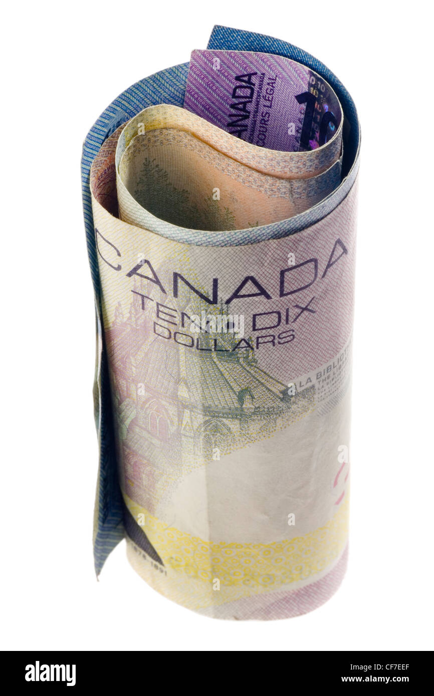 Laminati dollaro canadese note isolati su sfondo bianco Foto Stock