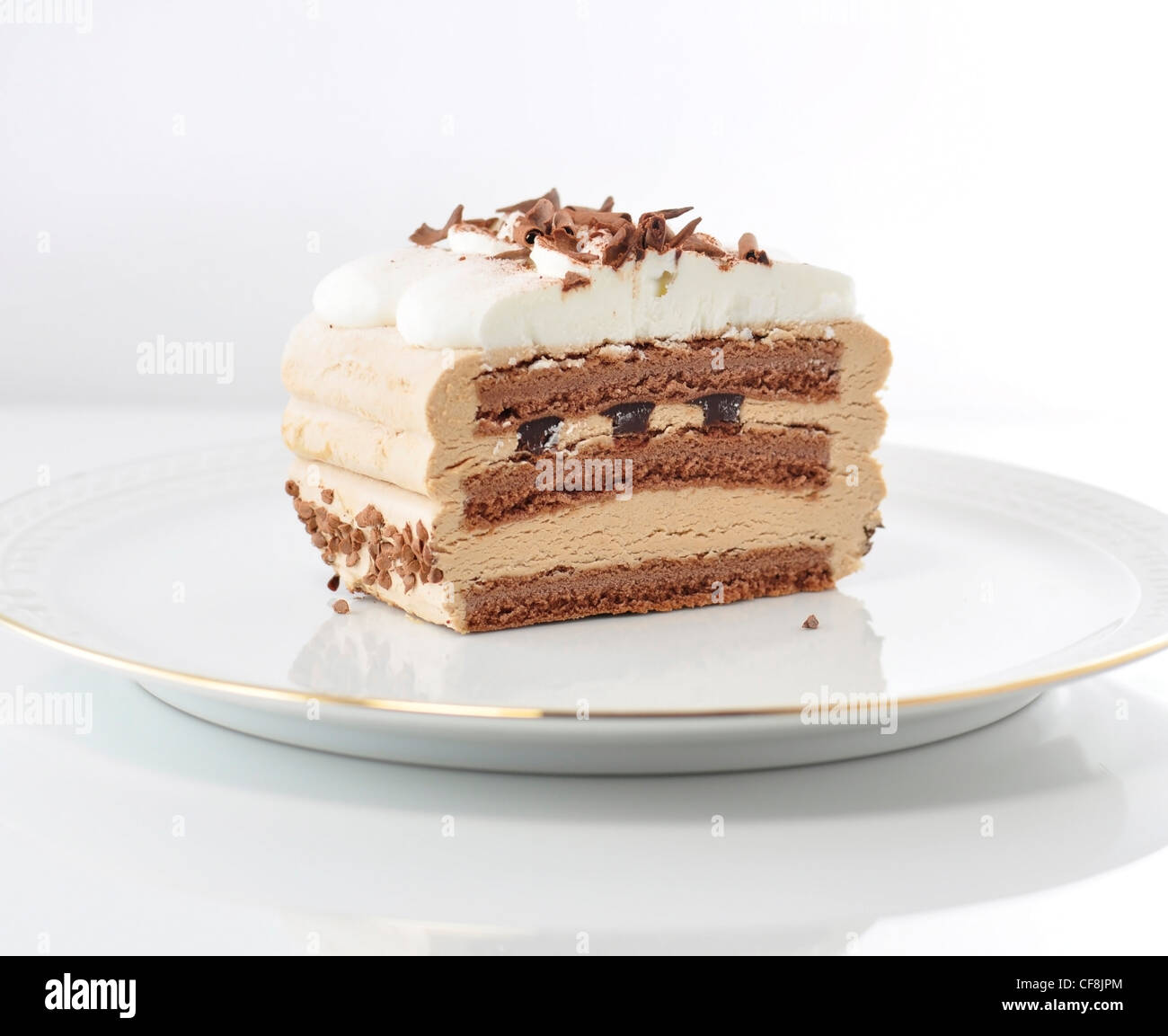 Crema cappuccino la torta su un piatto Foto Stock