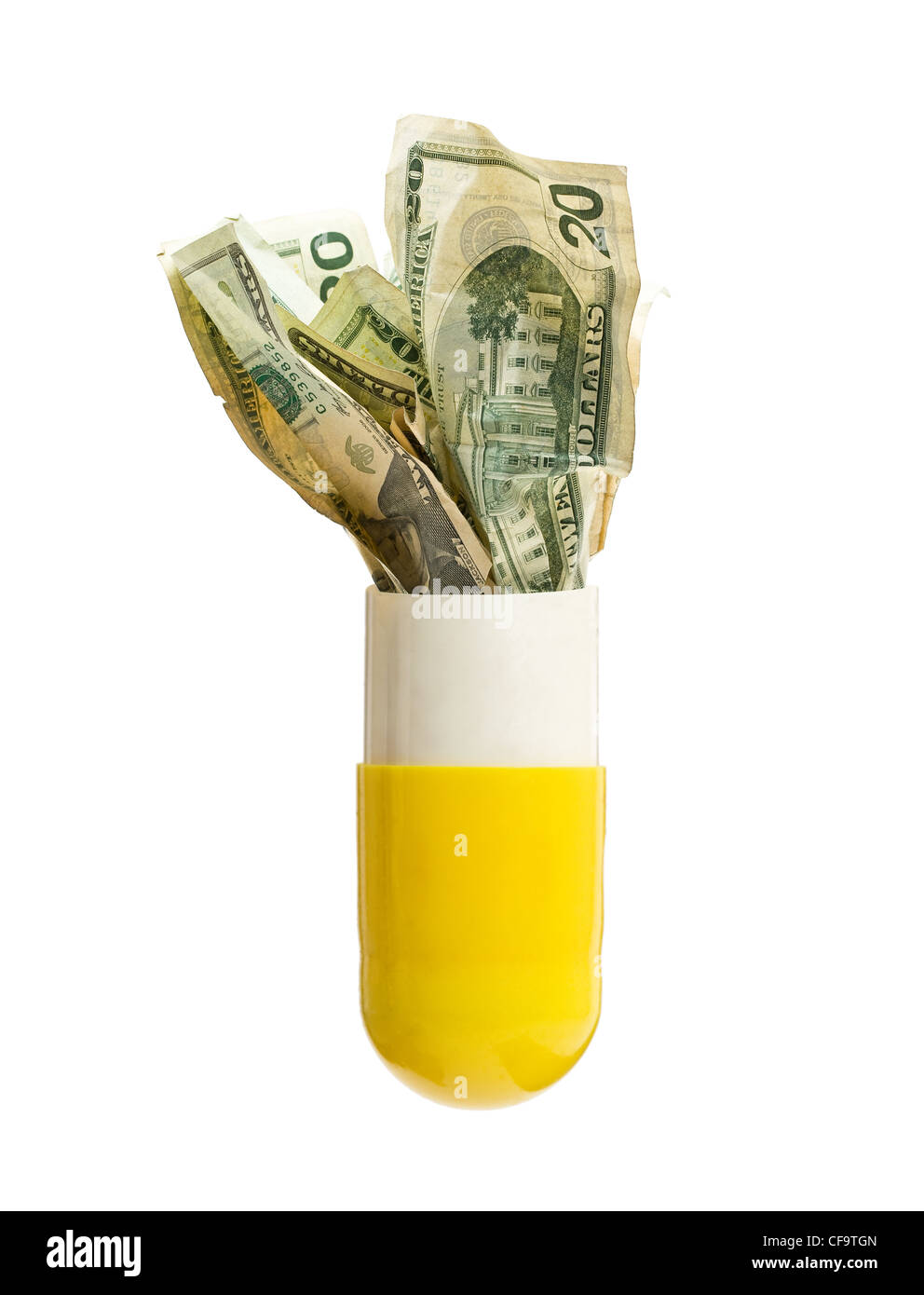 Le fatture del dollaro nella capsula di medicina - i costi sanitari concept Foto Stock