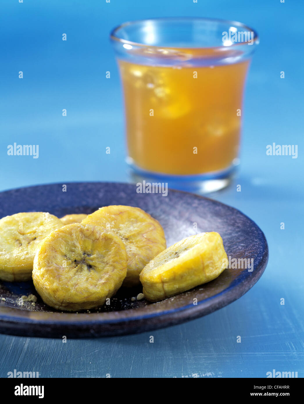Tableau: banana chips / roibush mango ice tea Foto Stock