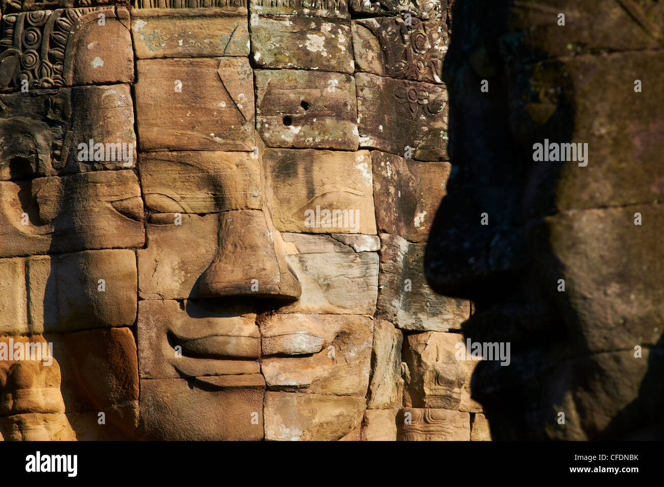 Dettaglio della scultura, tempio Bayon, risalente al XIII secolo, Angkor, Sito Patrimonio Mondiale dell'UNESCO, Siem Reap, Cambogia Foto Stock