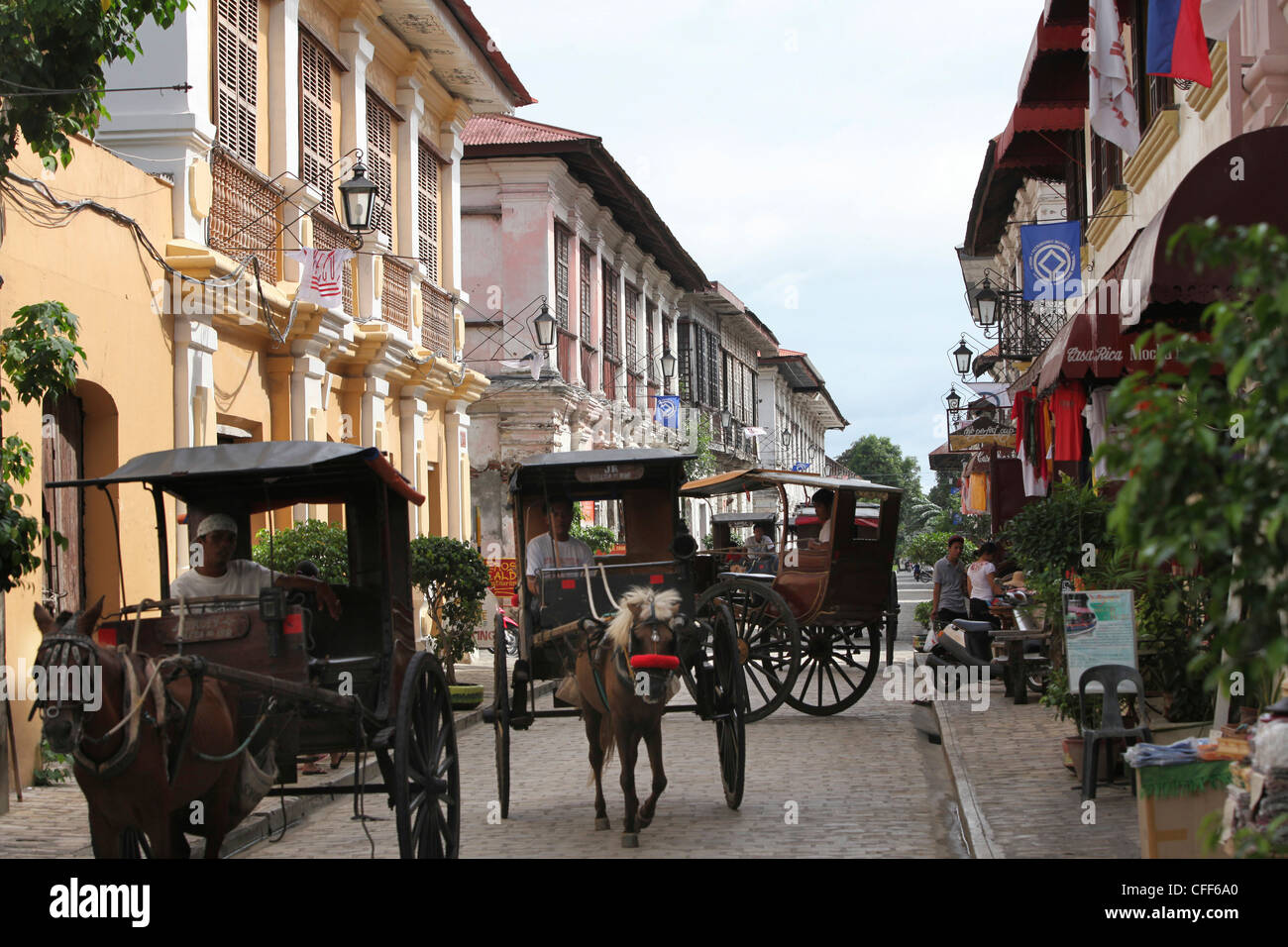 Horsecarts in Vigan, uno spagnolo città coloniale, Vigan, Ilocos Sur, Sito Patrimonio Mondiale dell'UNESCO, isola di Luzon, Filippine Foto Stock