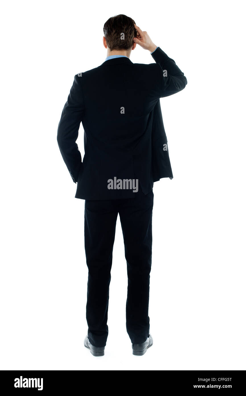 Retro-posa di una persona aziendali pensando disco isolate su sfondo bianco Foto Stock