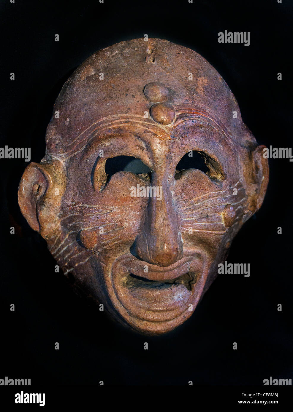 Smorfie maschera apotropaica ( via sfortuna ), IN TERRACOTTA FINE 7 - VI secolo A.C. Cartagine Tunisia Foto Stock