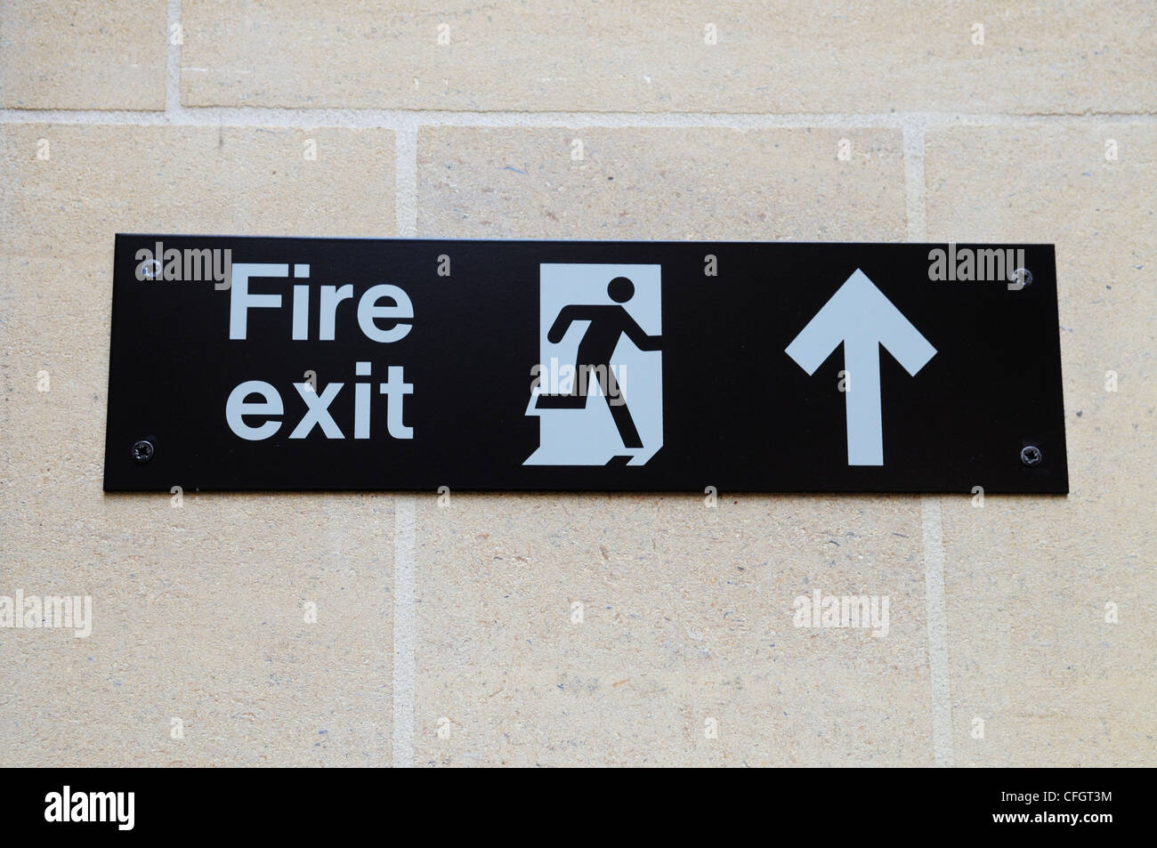 Fire Exit segno, Cambridge, Inghilterra, Regno Unito Foto Stock