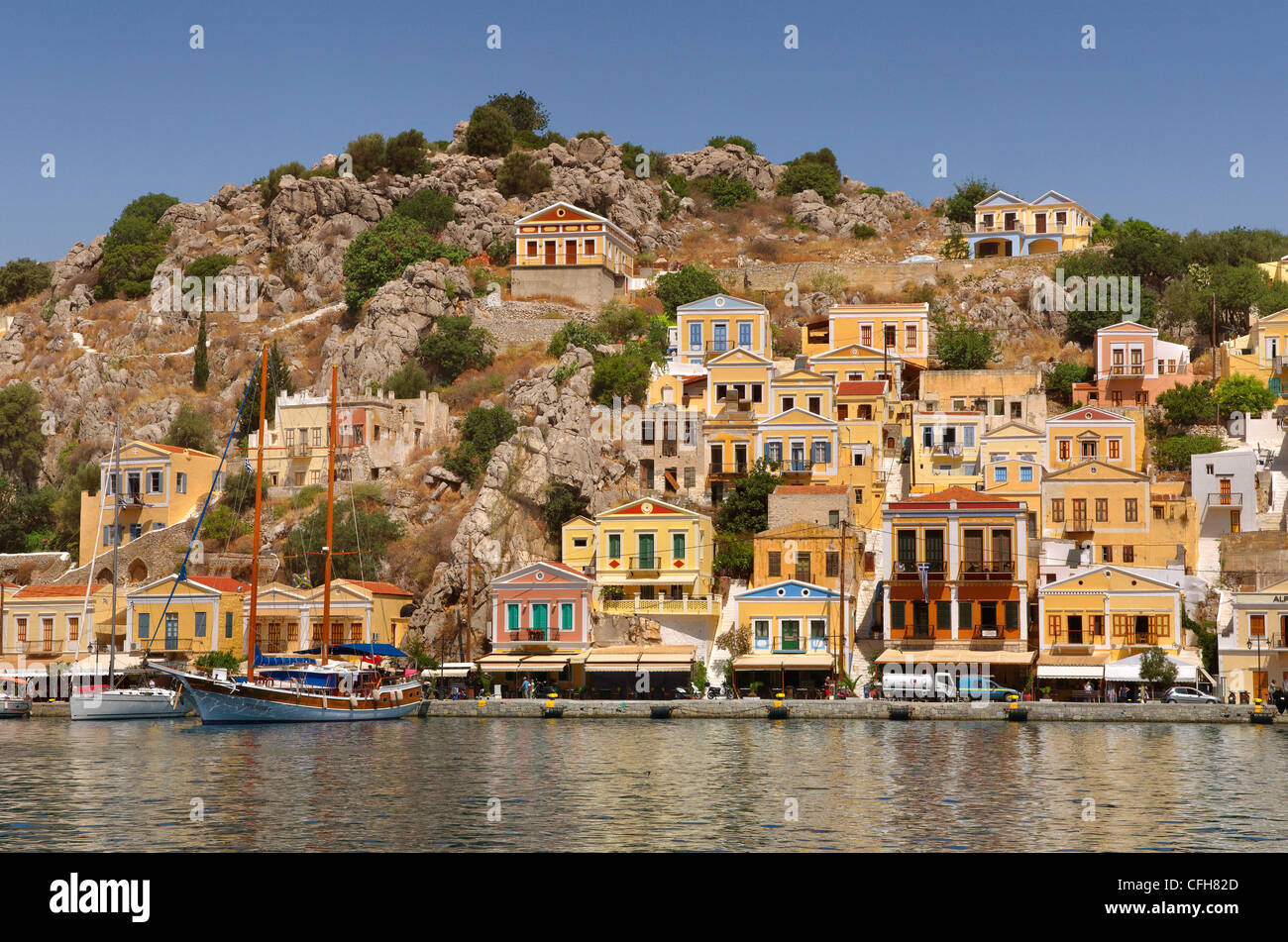 Porto di Symi, isola greca di Symi, Egeo Dodecaneso Isola Gruppo, Grecia Foto Stock