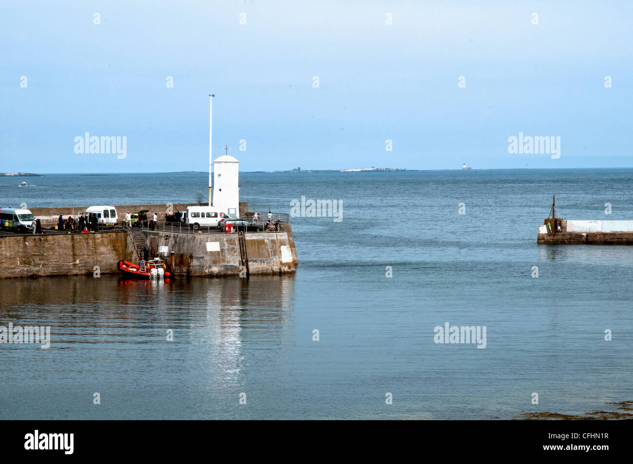 Porto seahouses farnes entrata in background Foto Stock