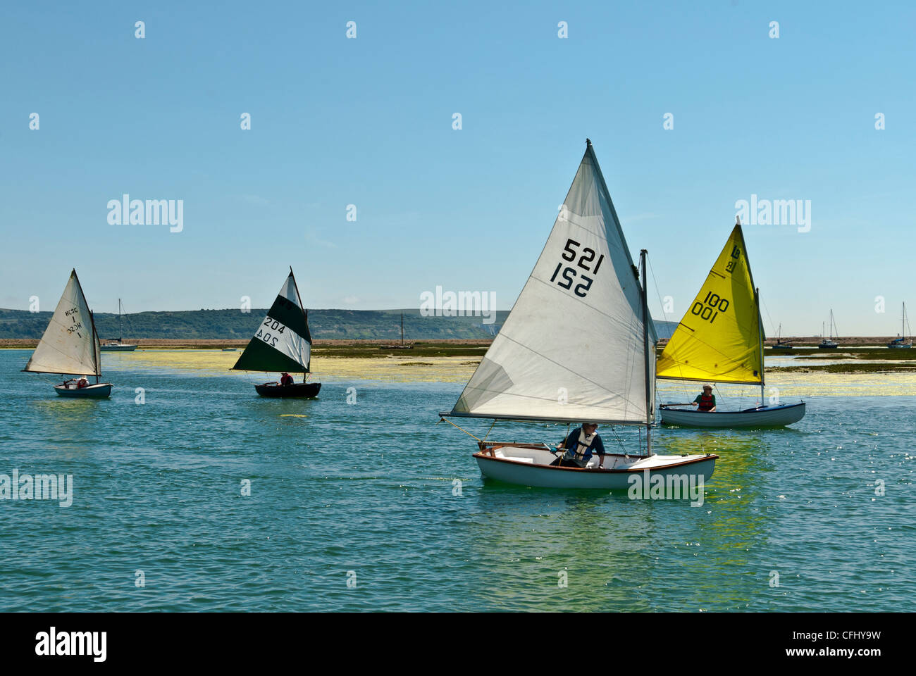 Regno Unito Hampshire Keyhaven squallido vele da competizione Scow 1 persona gaff truccate barche Foto Stock