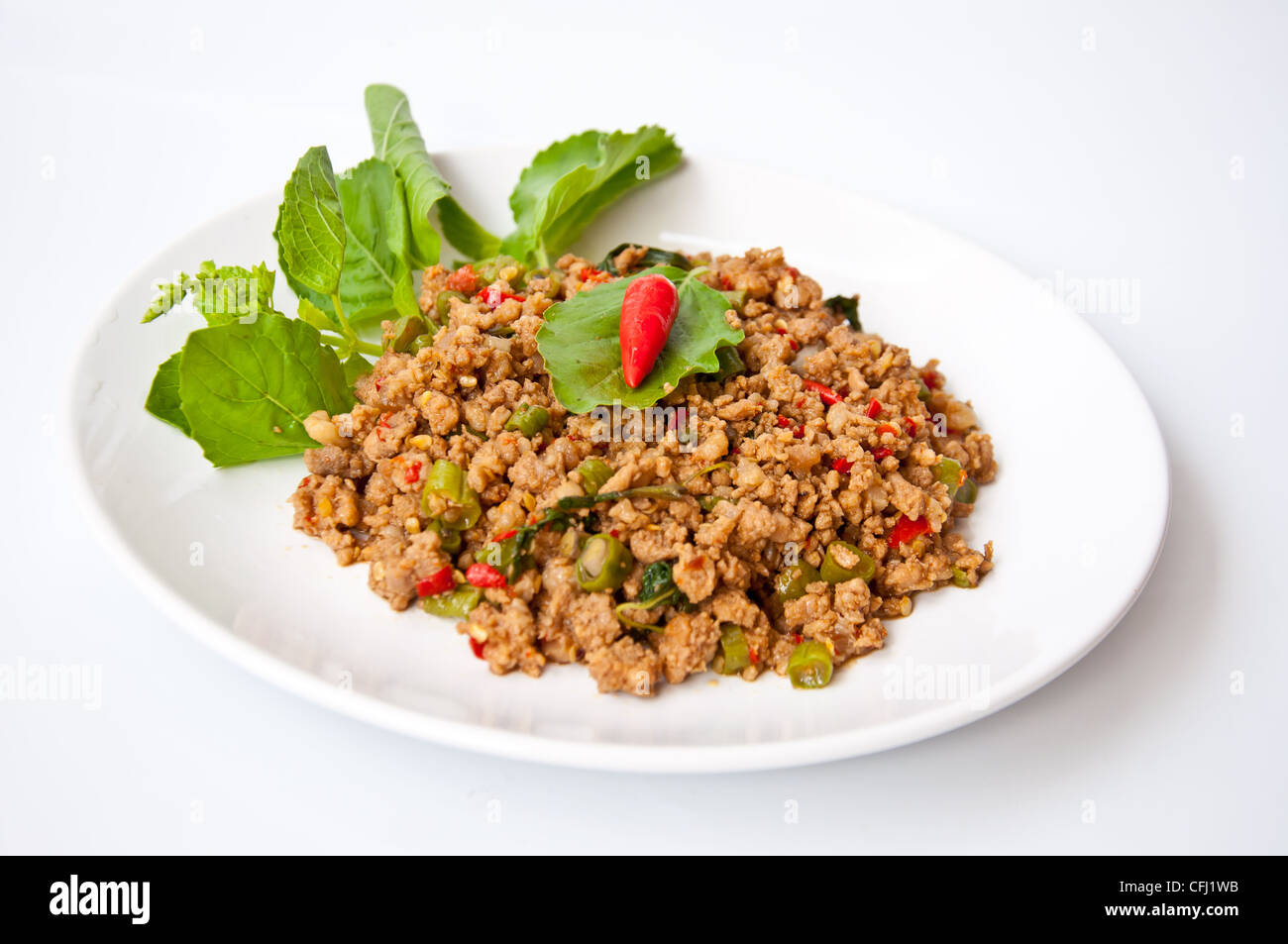 Delizioso cibo tailandese chiamata KAPRAO PUD MOO Foto Stock