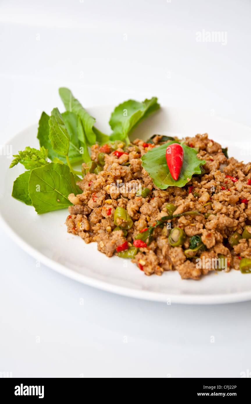 Delizioso cibo tailandese chiamata KAPRAO PUD MOO Foto Stock