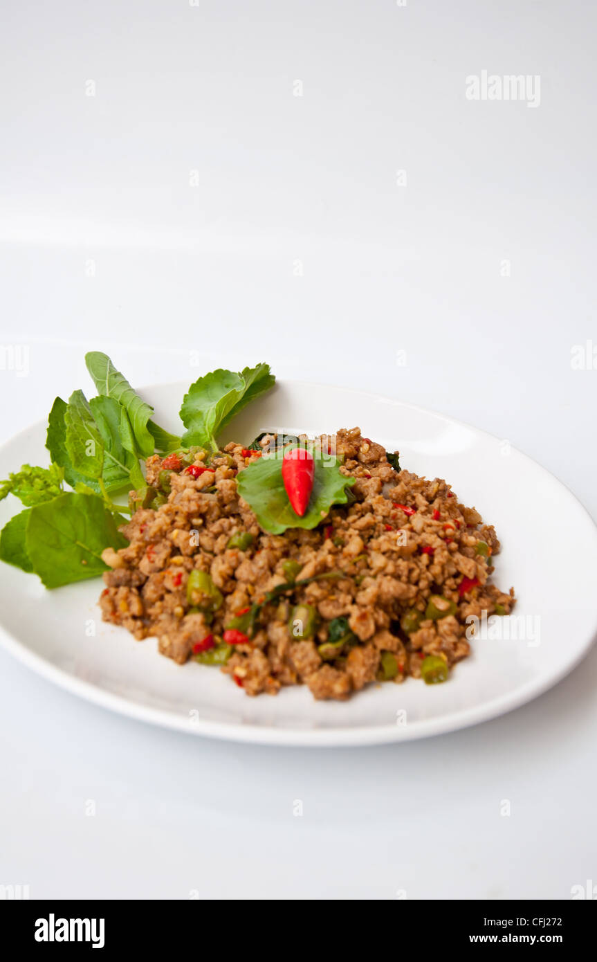 Delizioso cibo tailandese chiamata KAPRAO PUD MOO Foto Stock