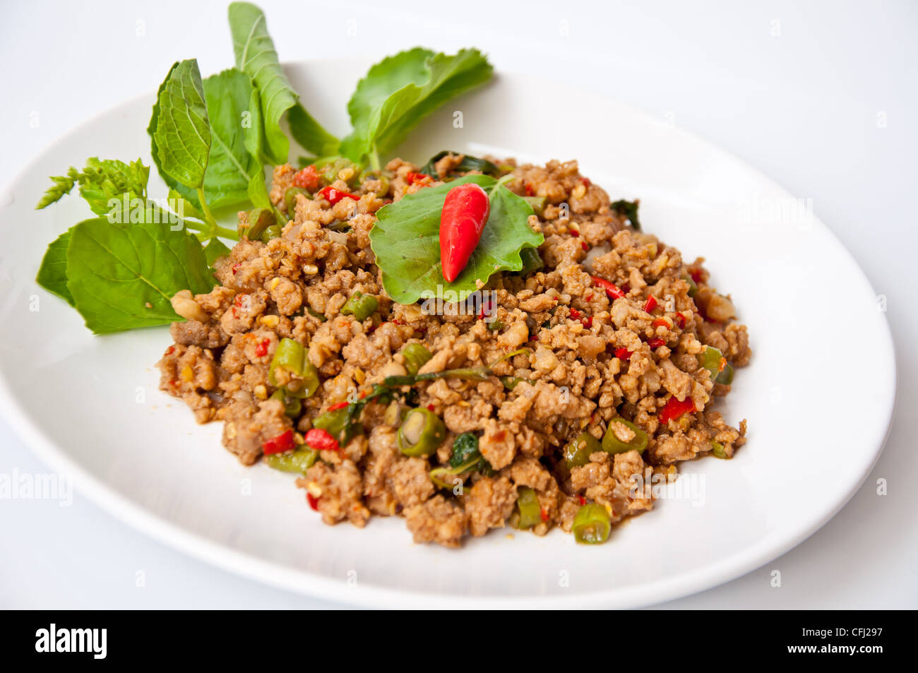 Delizioso cibo tailandese chiamata KAPRAO PUD MOO Foto Stock