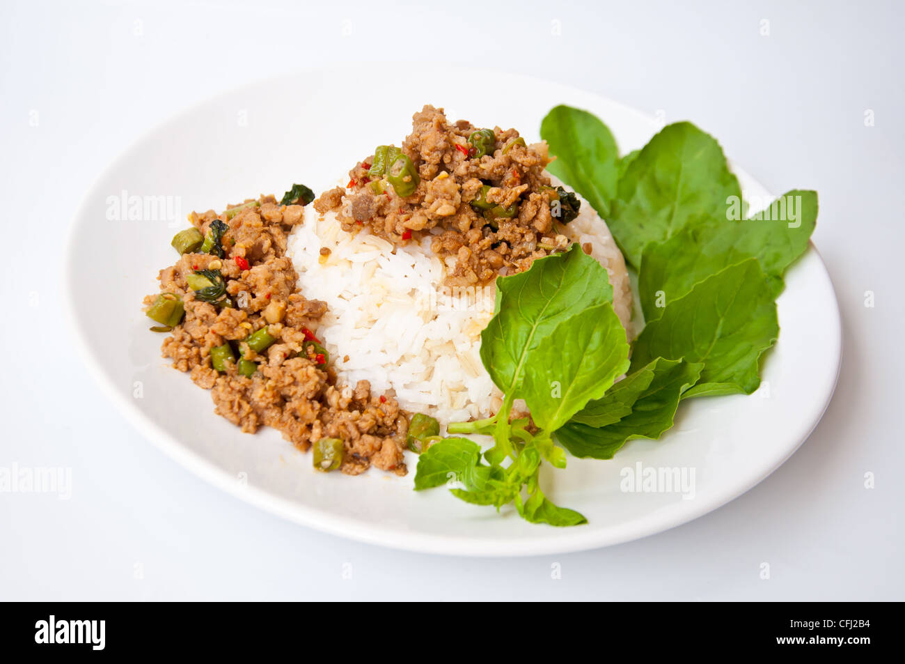 Delizioso cibo tailandese chiamata KHAO KAPRAO MOO Foto Stock