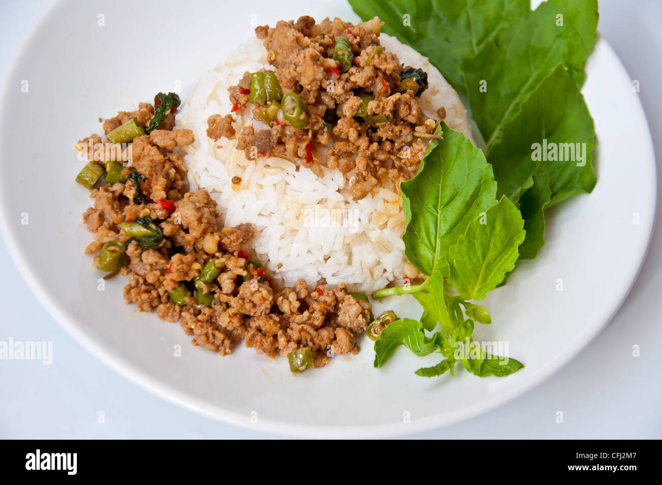 Delizioso cibo tailandese chiamata KHAO KAPRAO MOO Foto Stock