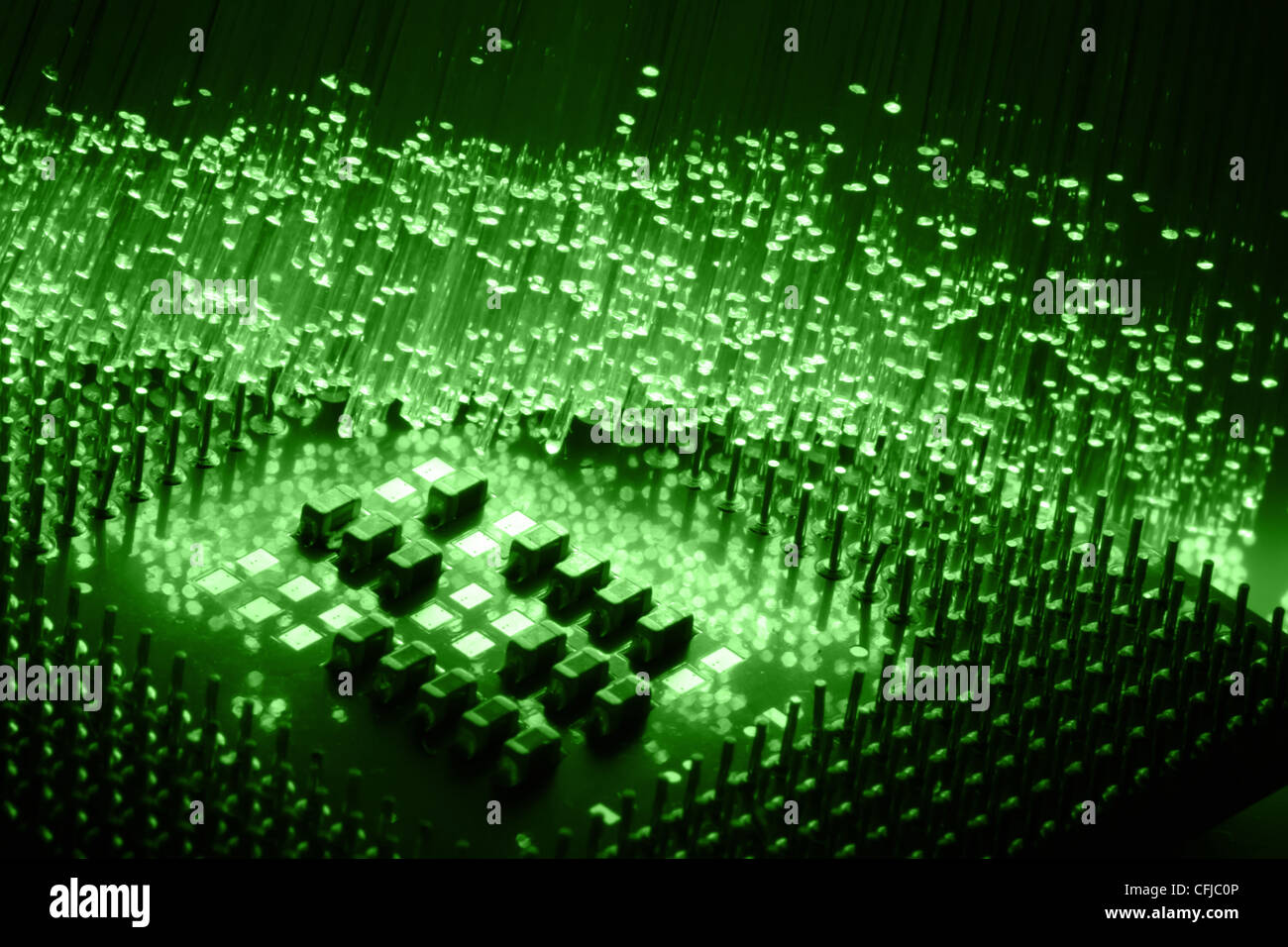 Fibre ottiche lo sfondo con un sacco di punti luminosi Foto Stock