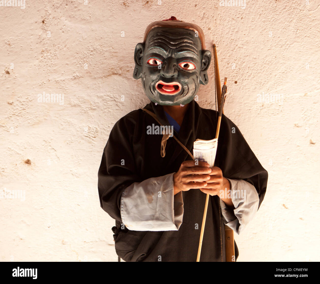 Monaco vestito come un clown, Wangdue Phodrang (Wangdi), Bhutan, Asia Foto Stock