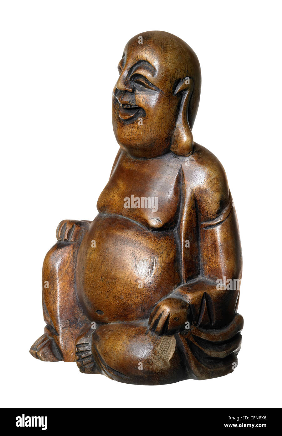 Studio fotografico di un Buddha in legno scultura in retro bianco Foto Stock