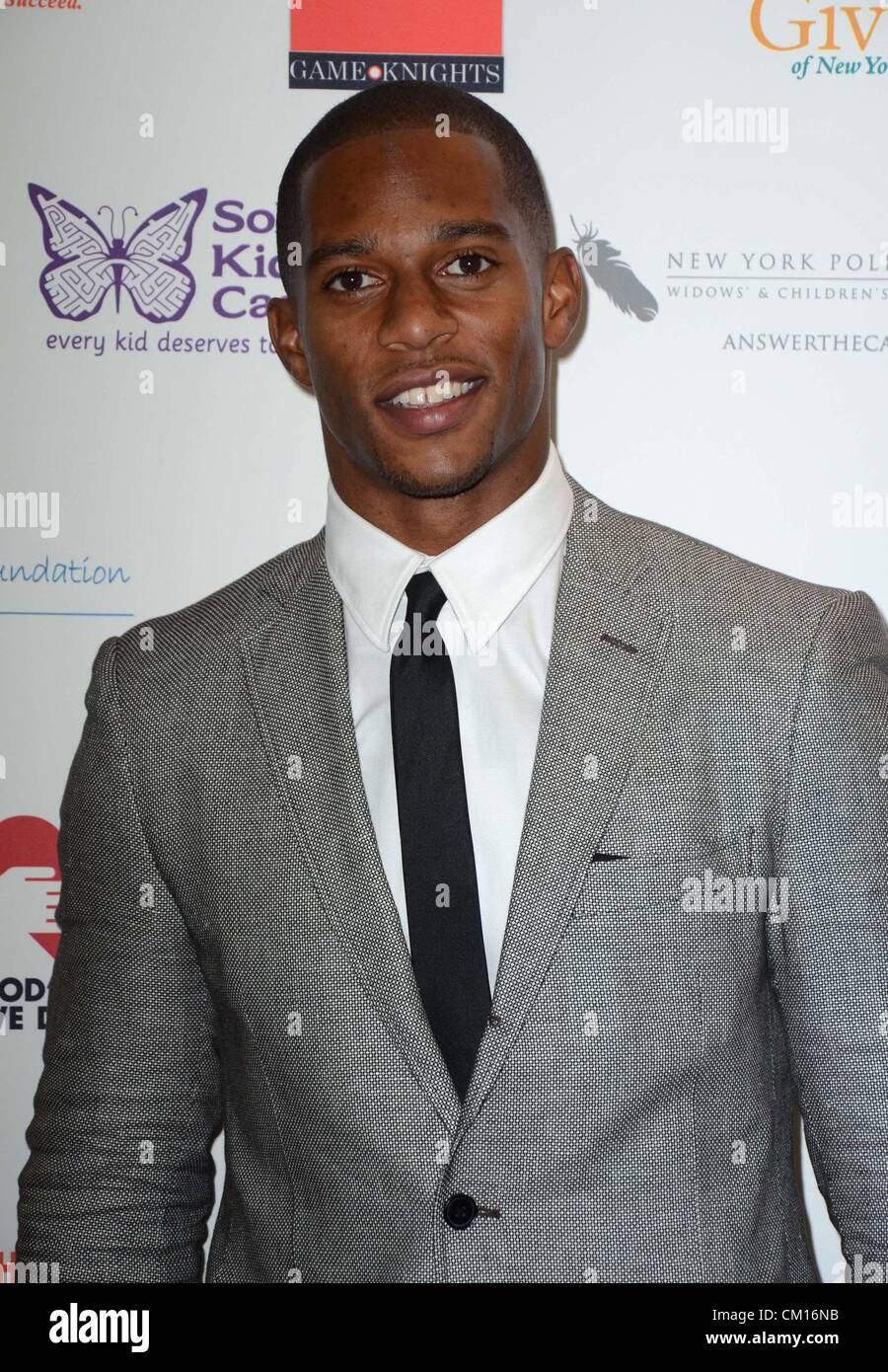 Victor Cruz di presenze per BGC Partners carità giorno Fundraiser annuale, BGC Partners uffici, New York, NY Settembre 11, 2012. Foto di: Derek Storm/Everett Collection Foto Stock