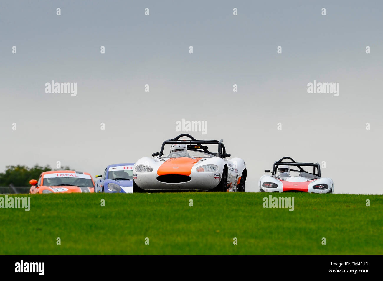 30.09.2012 Derby, Inghilterra. Britains grande Medaglia d'oro alle Olimpiadi vincendo via ciclista Jason Kenny (GBR) in azione nel suo Ginetta G20 Durante gara 2 del totale Quartz Ginetta GT5 Challenge round a Donington Park circuito, UK. Foto Stock