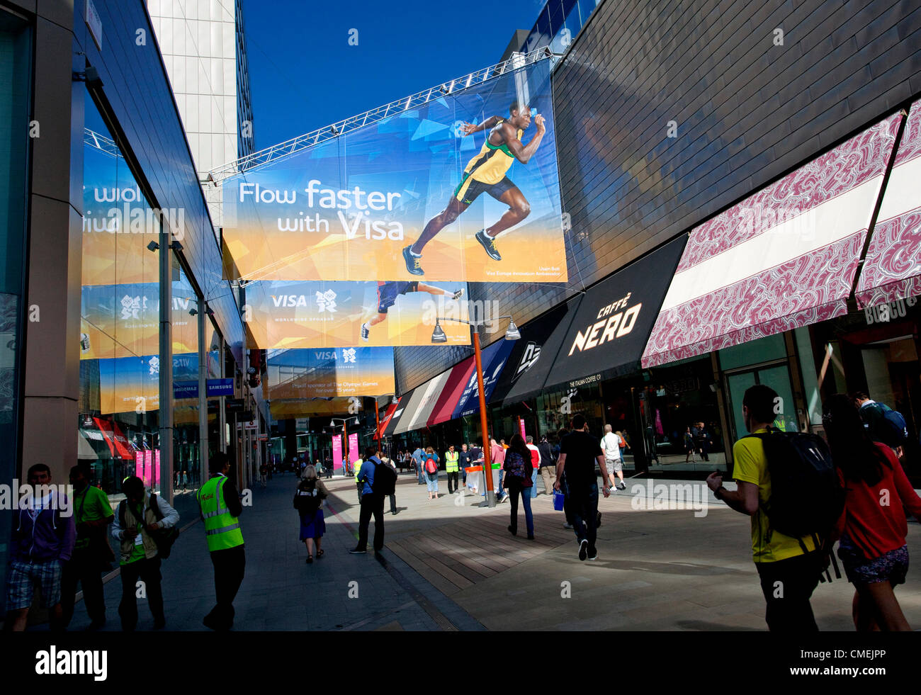 Sponsorizzazioni aziendali, branding e il commercio al dettaglio nelle Olimpiadi di Londra 2012 - Visa annuncio nel centro commerciale Westfield con Usain Bolt Foto Stock