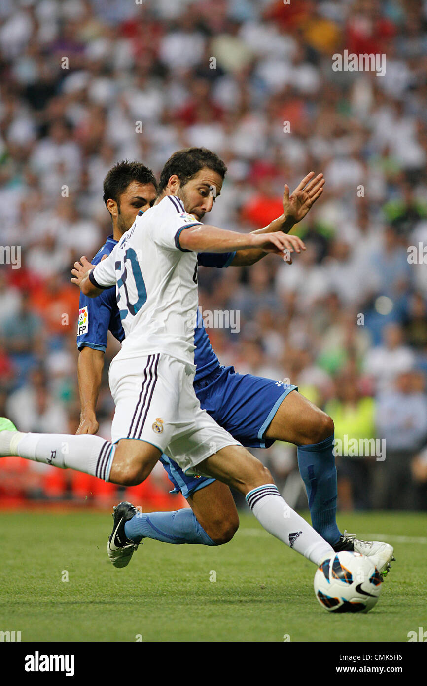 19/08/2012 - Spagna Football, La Liga / Giornata 1 - Real Madrid vs Valencia CF - facce Higuain Victor Ruiz Foto Stock