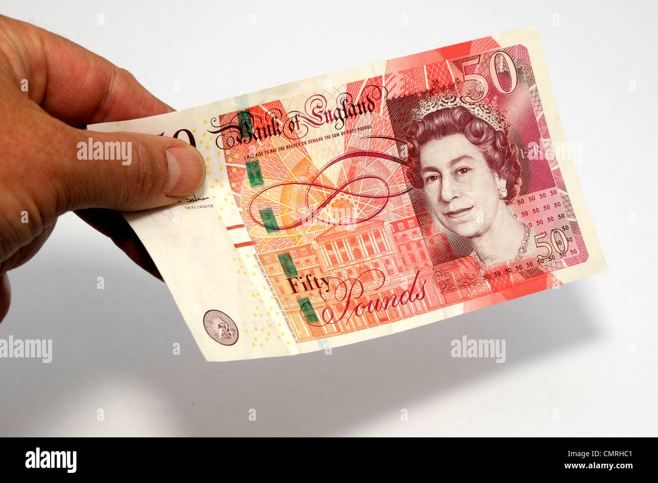 Gran Bretagna UK 50 cinquanta pound nota banca in mano. Foto Stock