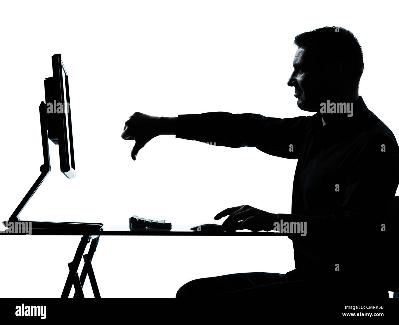 Uno caucasico uomo business computing computer pollice giù orinato silhouette in studio isolato su sfondo bianco Foto Stock