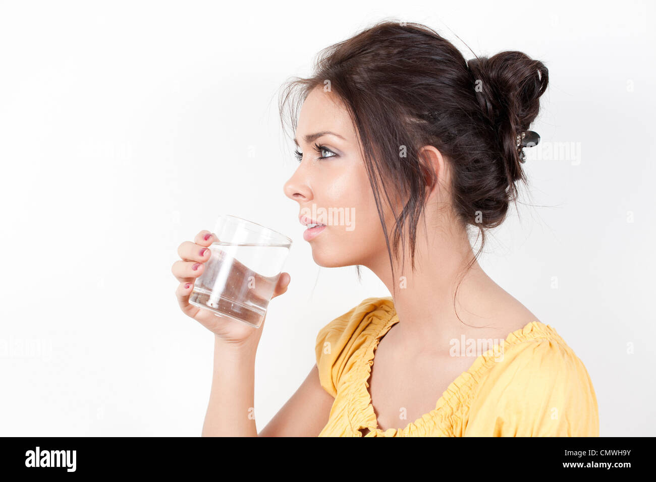 Donna di acqua potabile - MR Foto Stock