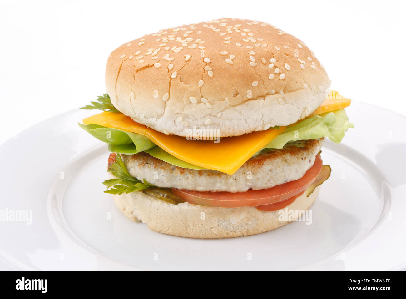 Cheeseburger sulla piastra Foto Stock