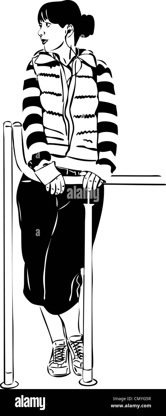 Una ragazza con le cuffie per ascoltare musica Foto Stock