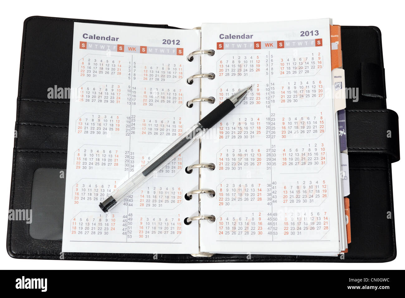 Calendario in notebook con una penna su di esso Foto Stock