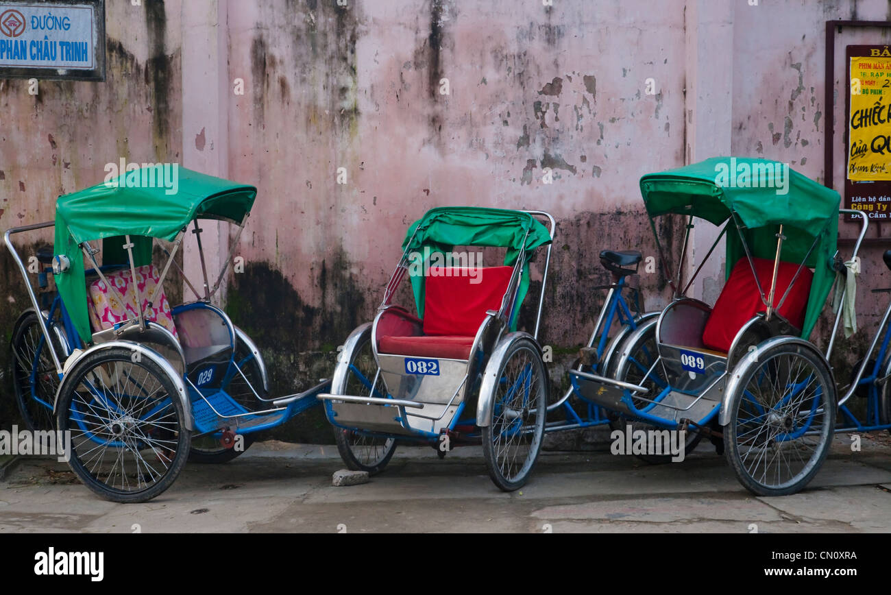 Cyclo nell antica città di Hoi An, sito Patrimonio Mondiale dell'UNESCO, Hoi An, Vietnam Foto Stock