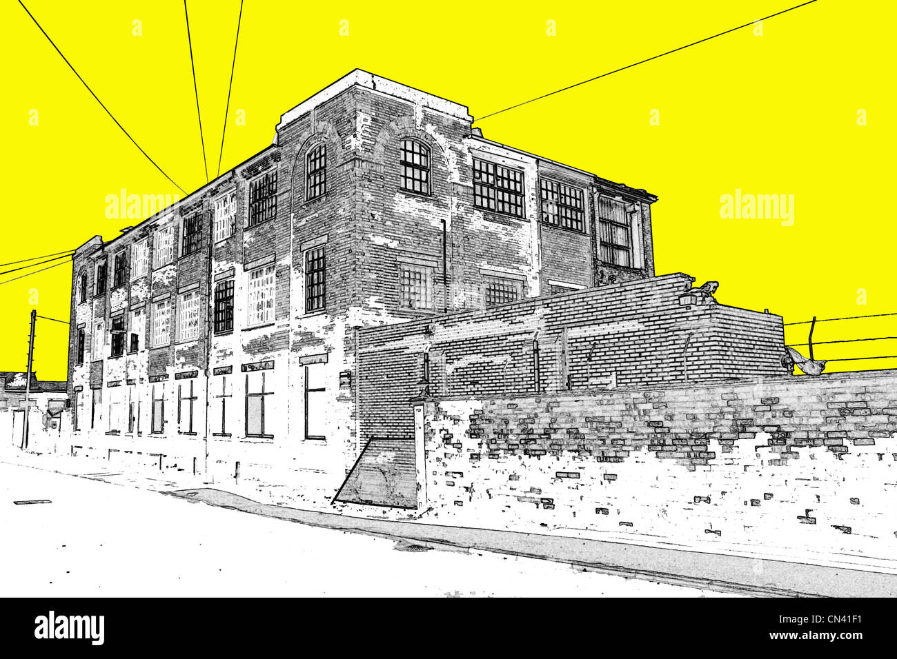 Cielo colorato dietro deadpan e brutto industriale edifici britannici dal nord dell'Inghilterra. Foto Stock