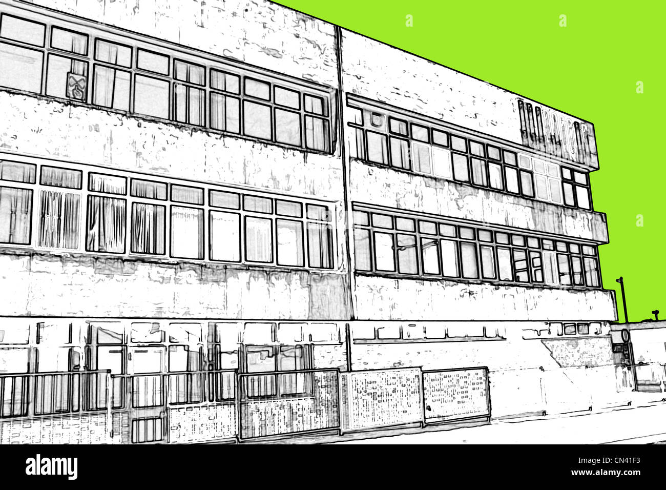 Cielo colorato dietro deadpan e brutto industriale edifici britannici dal nord dell'Inghilterra. Foto Stock