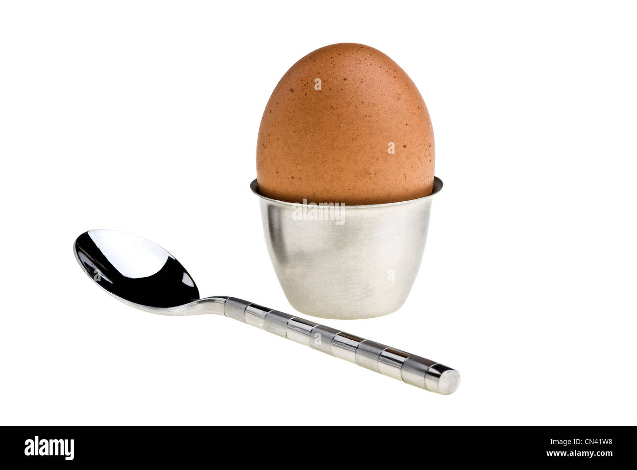 Uovo, eggcup e cucchiaio. Foto Stock