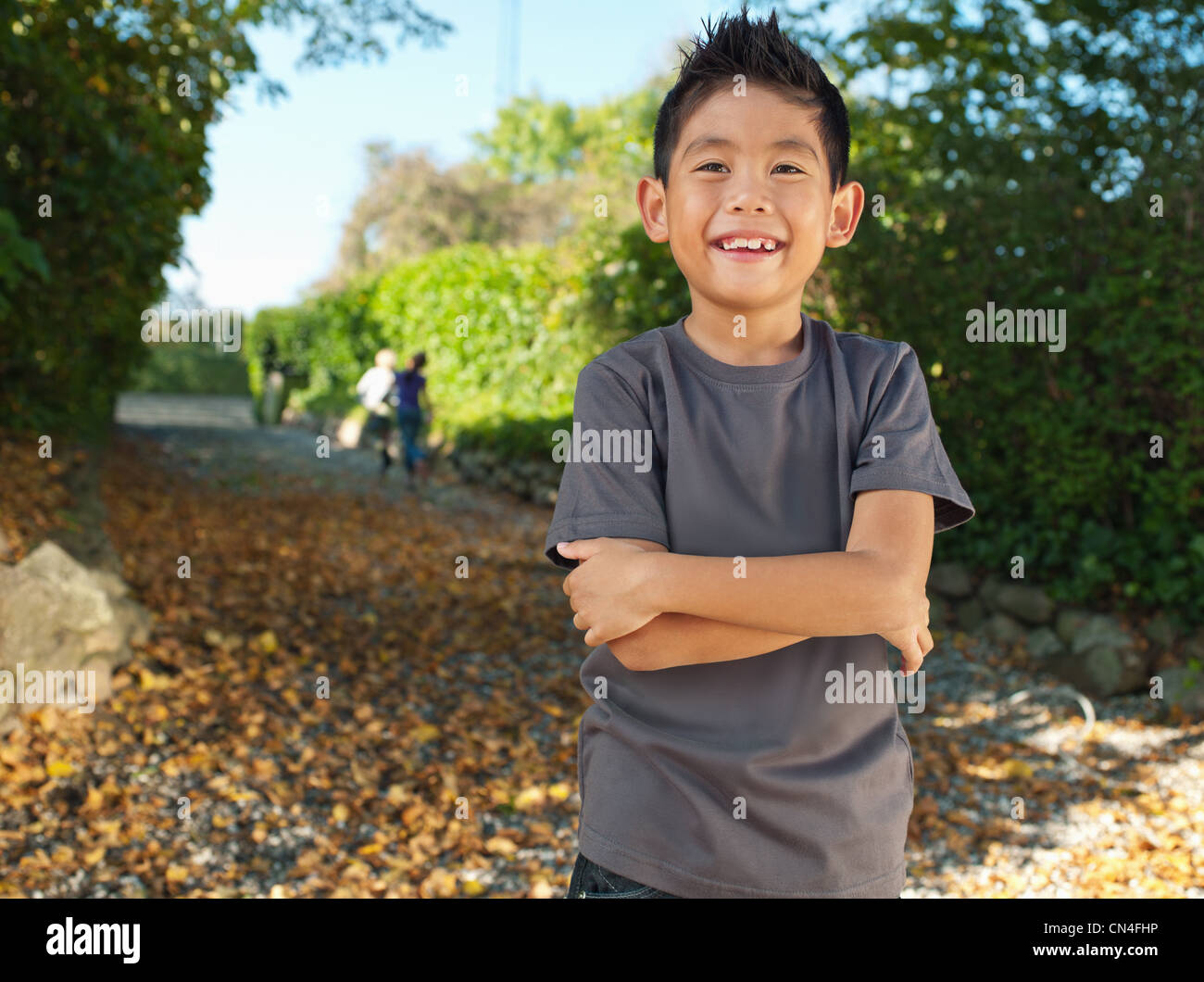 Giovani asiatici Ragazzo che sorride, ritratto Foto Stock