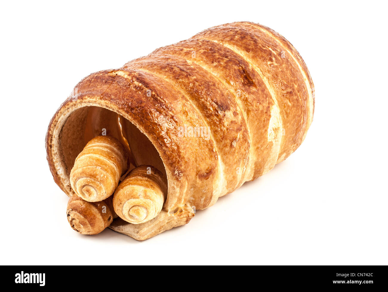 Tre vuoto tipiche italiane cannoli di pasta e di una big one su sfondo bianco Foto Stock