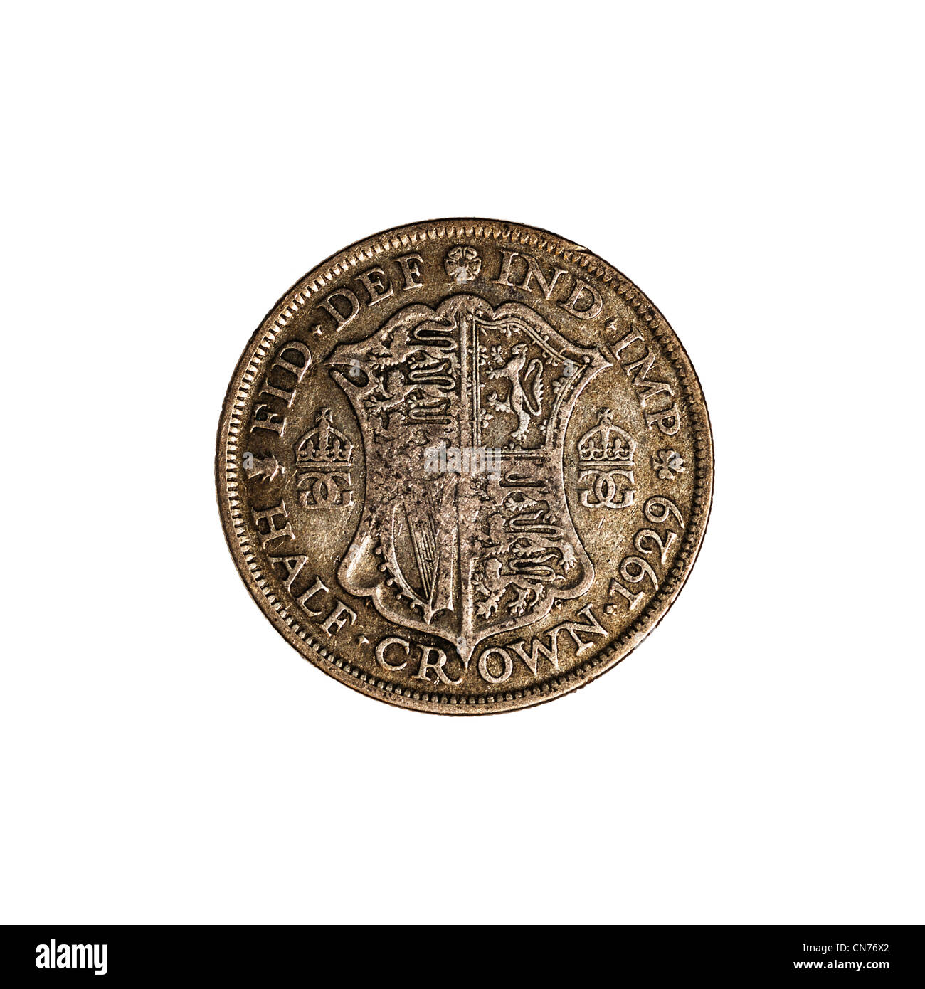 Un inglese pre decimal mezza corona moneta datata 1929 su sfondo bianco Foto Stock
