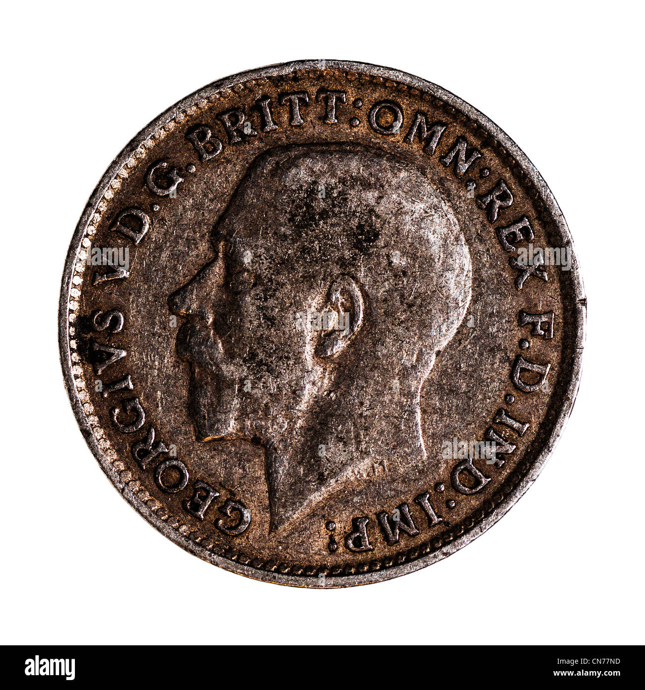 Un pre decimal George V argento britannico Threepence ( primo problema ) 3 pence moneta su sfondo bianco Foto Stock
