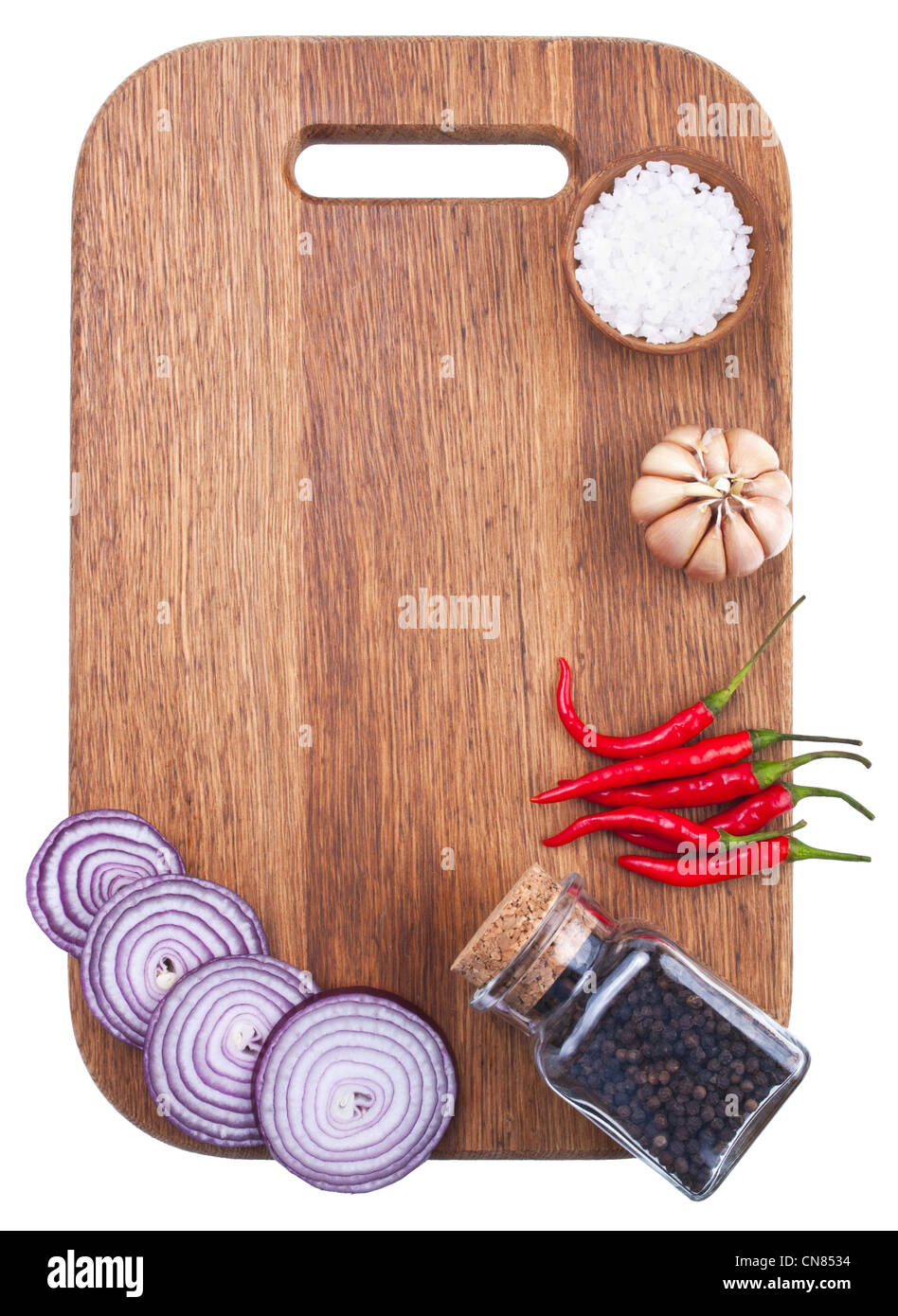 Sfondo culinario con verdure fresche sul bordo di taglio Foto Stock