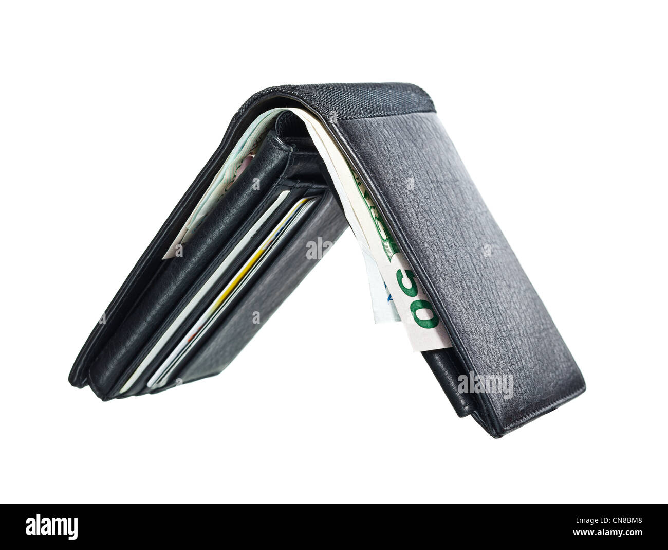 In cuoio nero portafoglio aperto con contanti e carte di credito in esso. Foto Stock