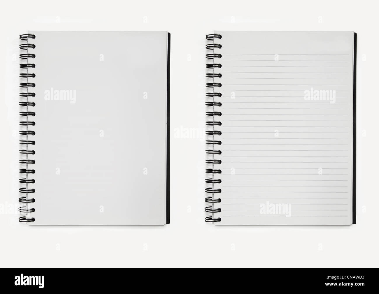 Due notebook carta spirale, linea e senza linea. Foto Stock